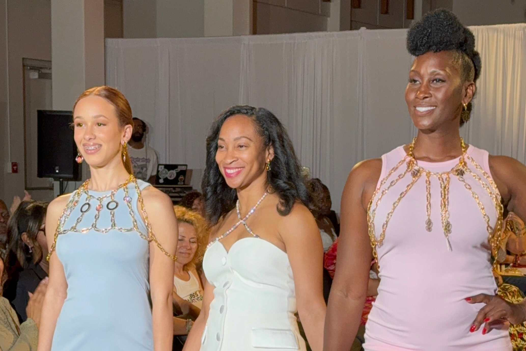 Noralis, Nixx, and Marlena pose for a photo on the runway at Haute Accessories Week.